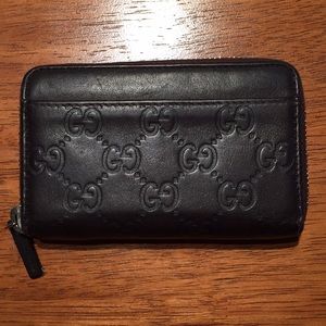 Brown Gucci signature woman’s wallet